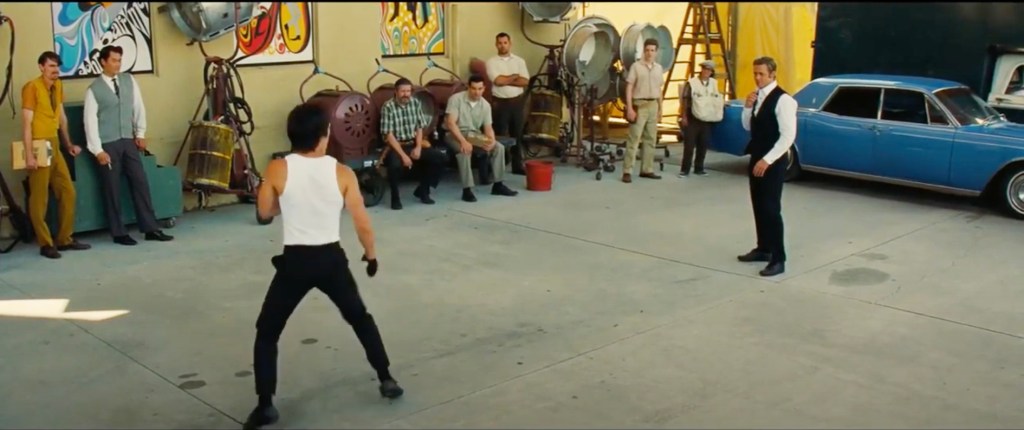 Image shows the backstage showdown between Bruce Lee and Cliff Booth.
